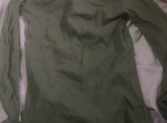 dark green long sleeved top